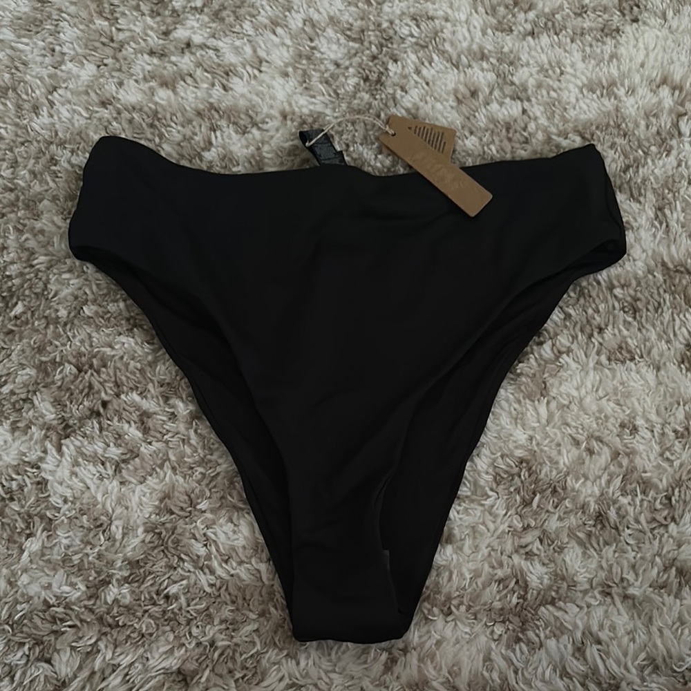 Skims high waisted swim bottoms